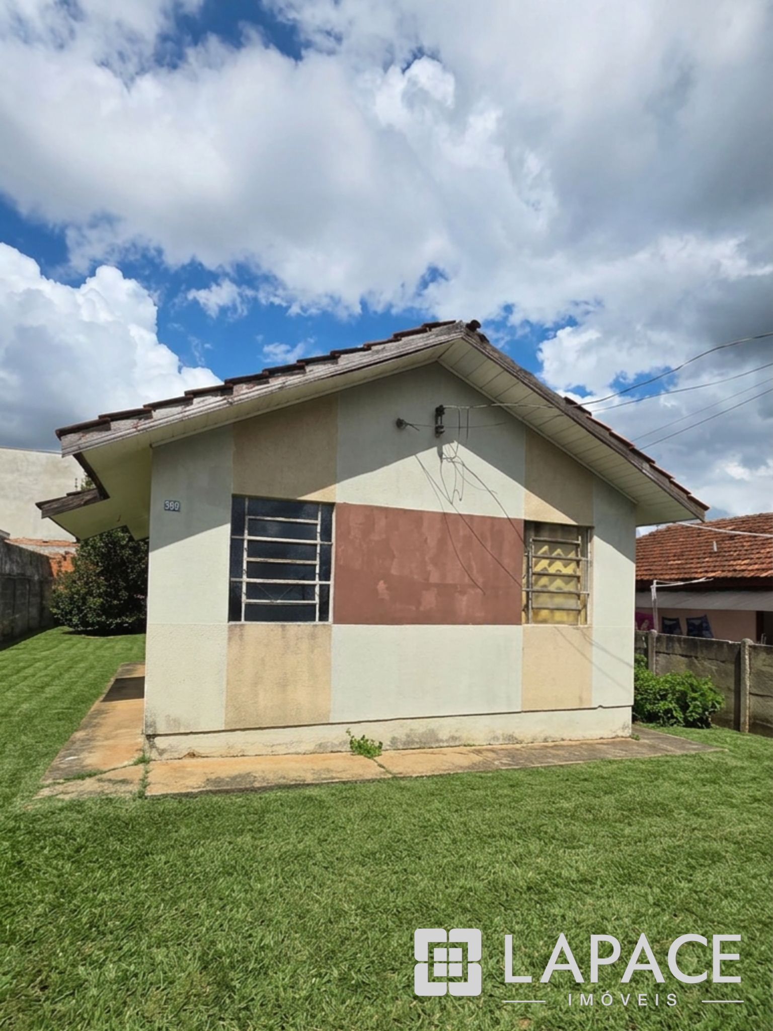 Terreno com Casa à Venda em rua paralela á Av Nicolau Kluppel Neto, na Santa Paula, bairro Contorno - Ponta Grossa | Lapace Imóveis — foto 1