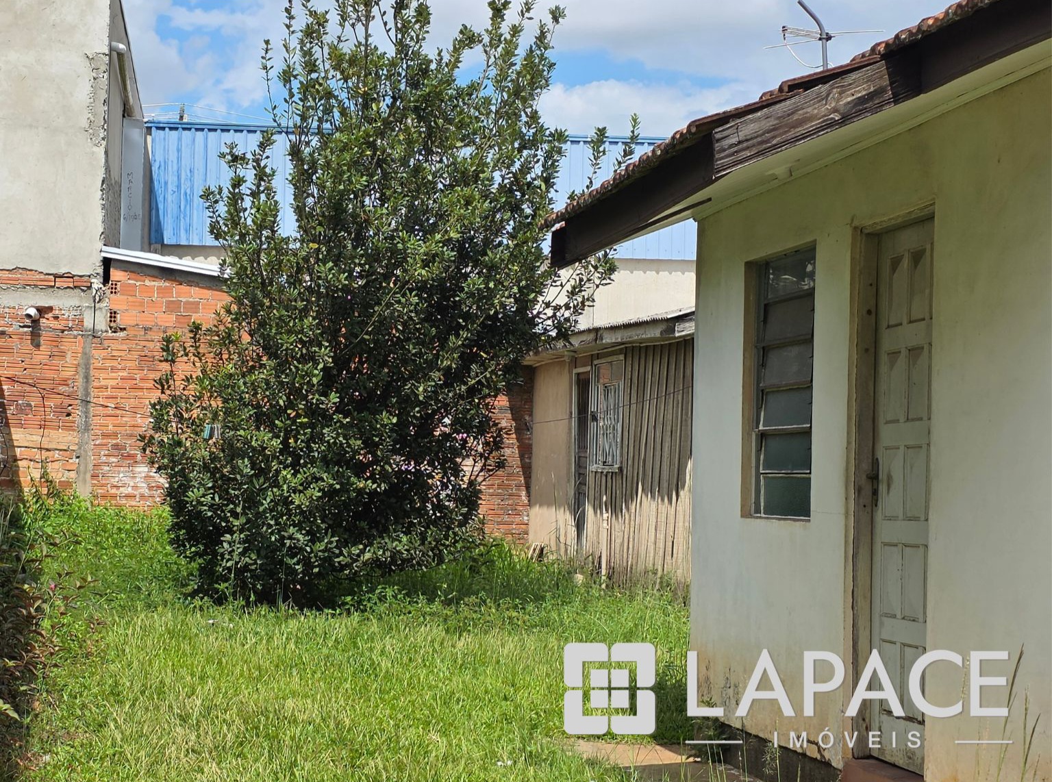 Terreno com Casa à Venda em rua paralela á Av Nicolau Kluppel Neto, na Santa Paula, bairro Contorno - Ponta Grossa | Lapace Imóveis — foto 2